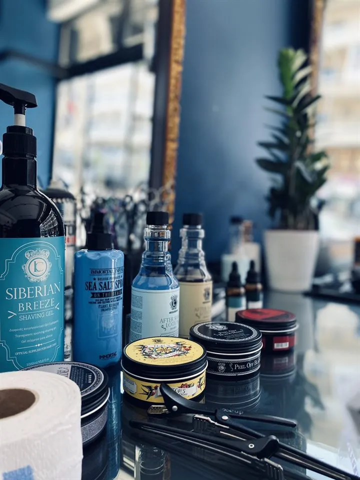 Grooming products at Buzz Cuts: shaving gel, sea salt spray, aftershave and pomades