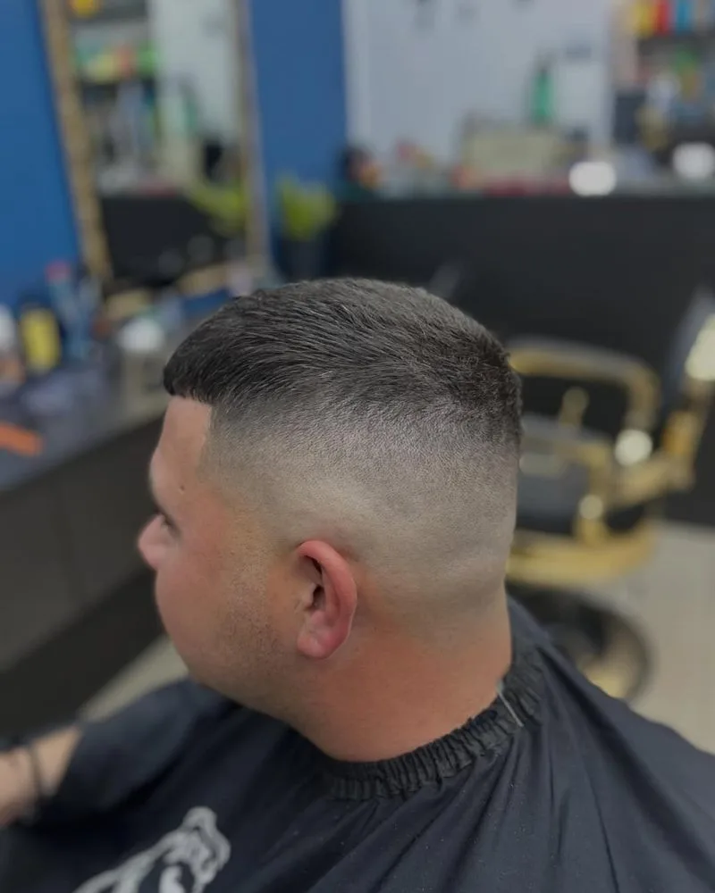 Skin fade with a short top